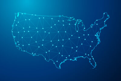 A digital map outline of the United States with interconnected nodes and lines on a blue background.